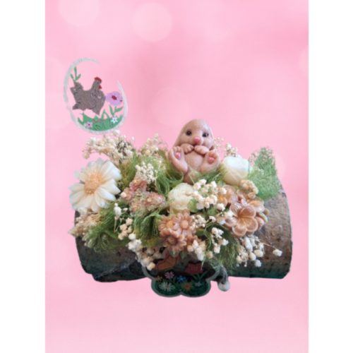 Bûche Fleurie Magnolia & Jasmin – Vue de Face Bûche fleurie en cire parfumée Magnolia et Jasmin, vue de face, création artisanale Douceur de Grasse.