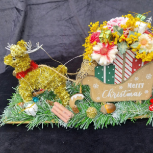 Le Traîneau du Renne Doré & Son Bouquet Fleuri
