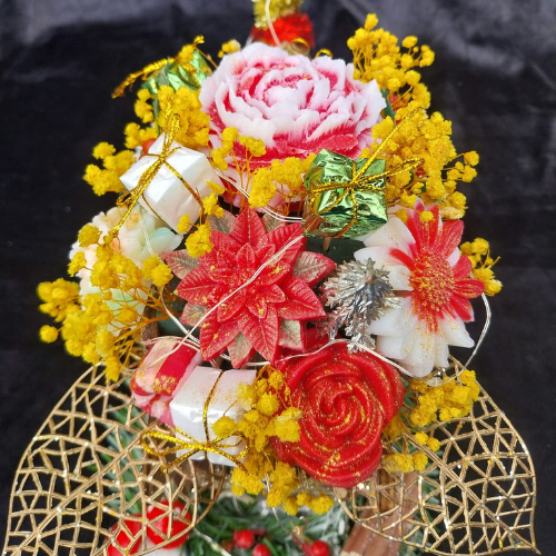 Le Traîneau du Renne Doré & Son Bouquet Fleuri