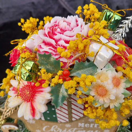 Le Traîneau du Renne Doré & Son Bouquet Fleuri